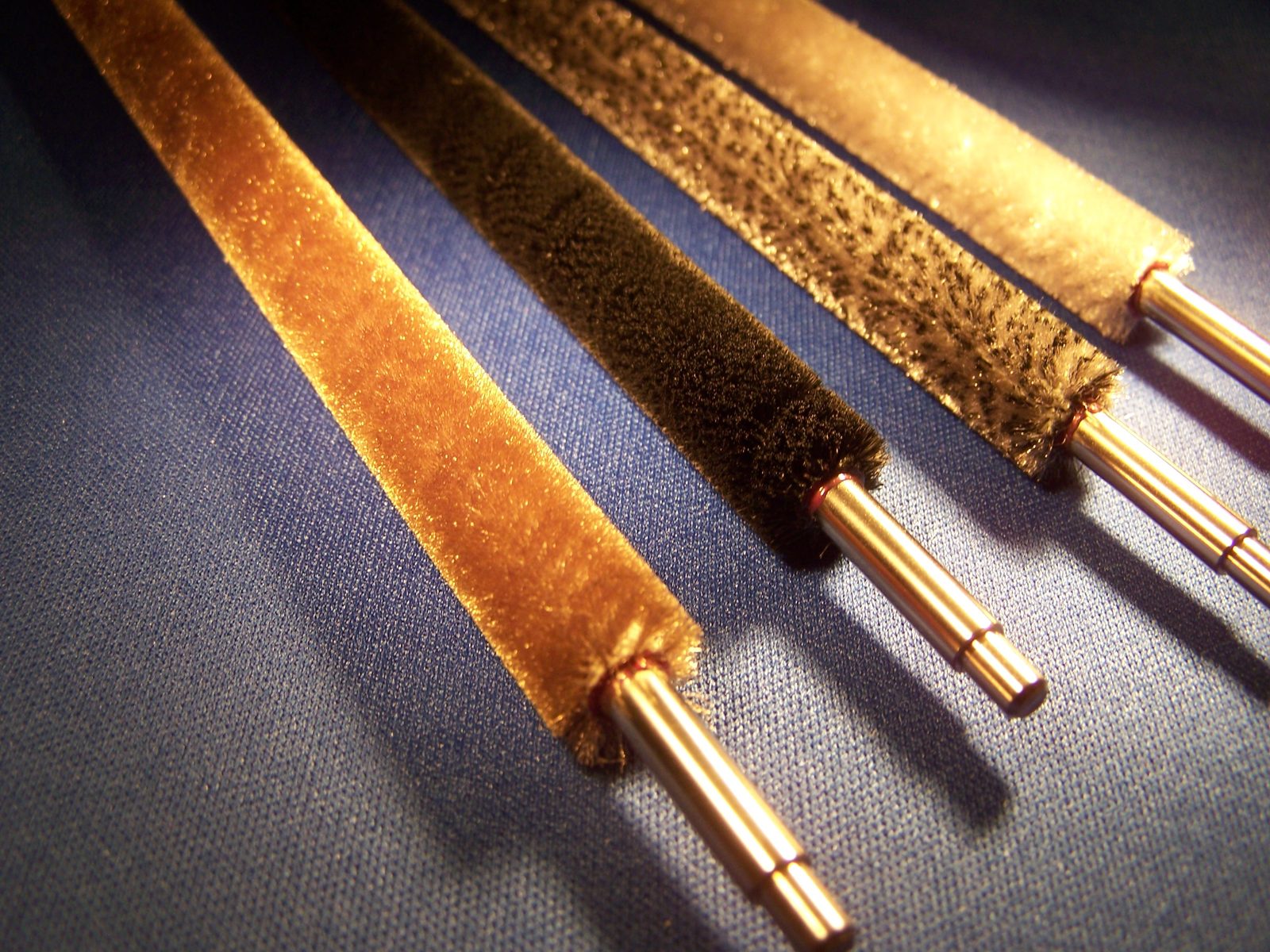 Published conductive roller-brush assemblies