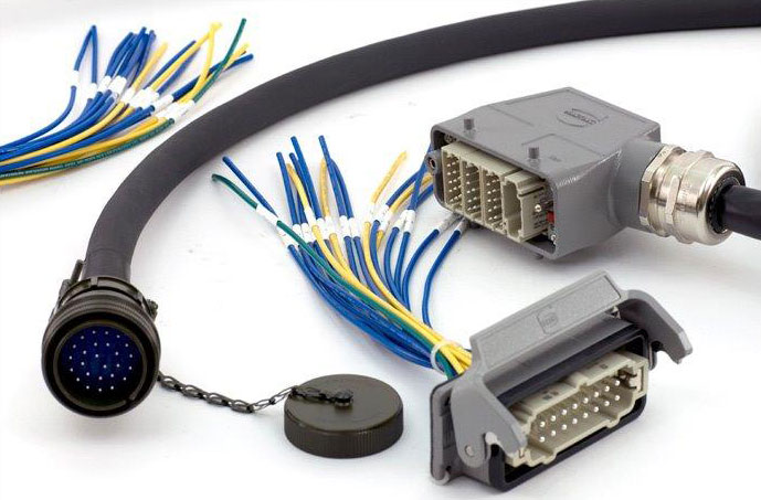 Wire harness with a circular socket, two rectangular connectors and multicolored wires